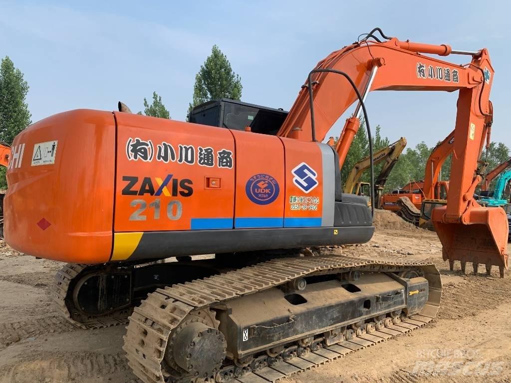 Hitachi ZX210G Beltegraver