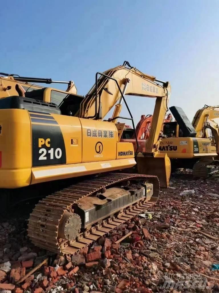 Komatsu PC 210 Beltegraver