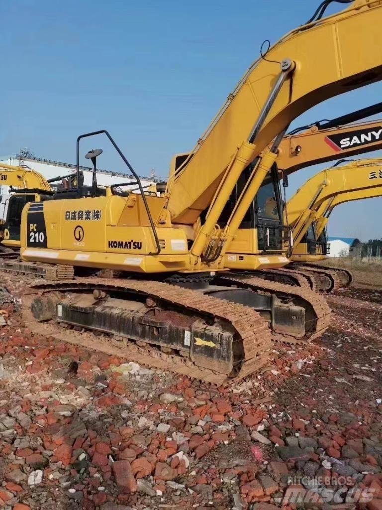 Komatsu PC 210 Beltegraver