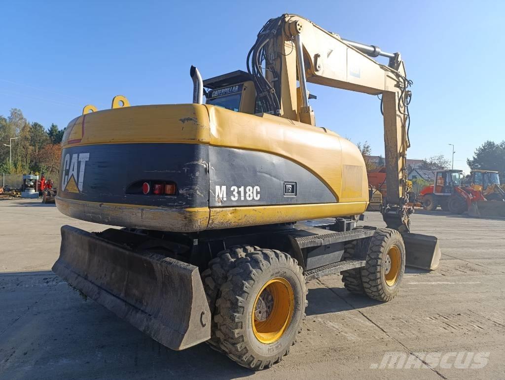 CAT M 318 C Hjulgravere