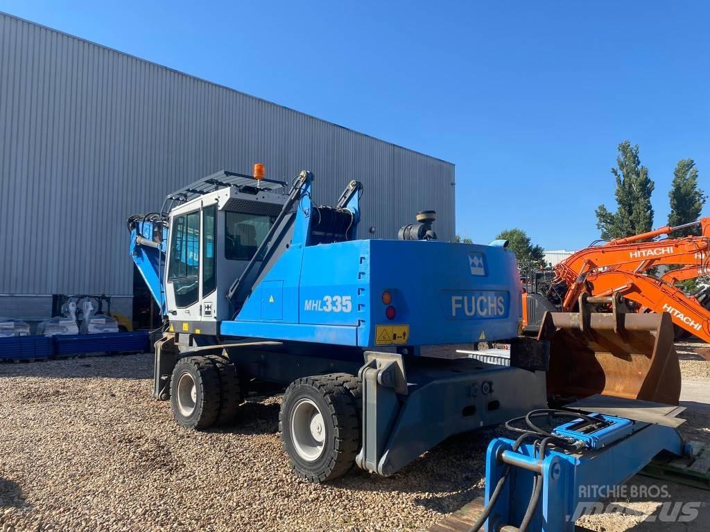 Fuchs MHL 335 Gravemaskiner for avfallshåndtering