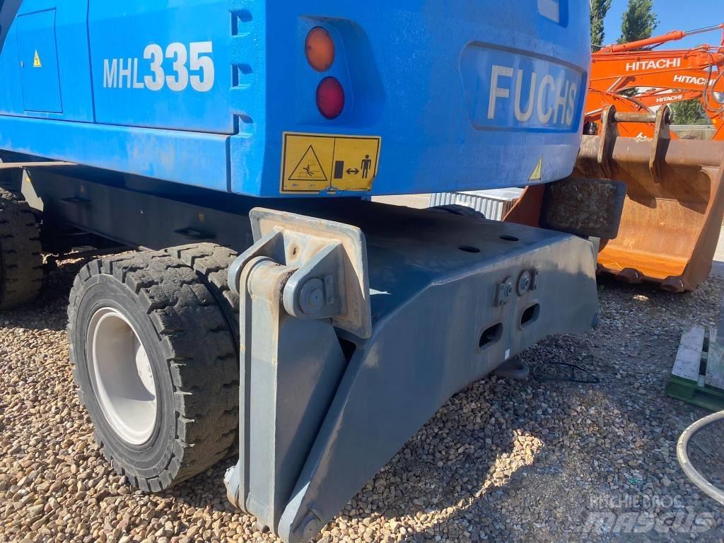 Fuchs MHL 335 Gravemaskiner for avfallshåndtering