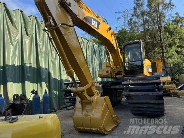 CAT 320 C Amfibiske Gravemaskiner