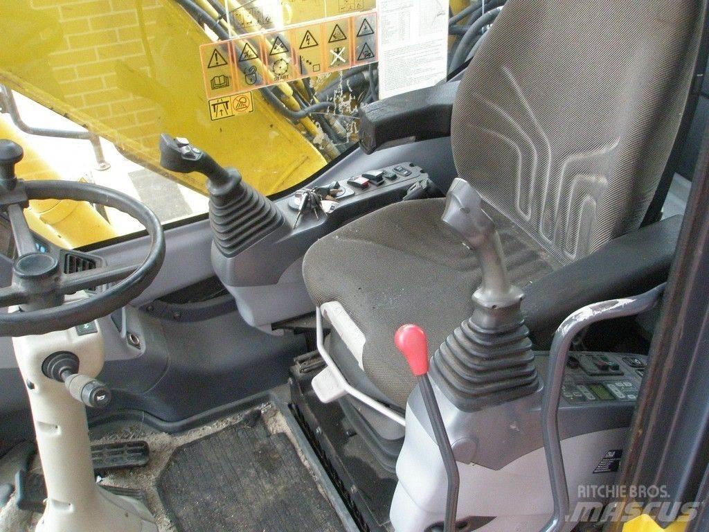 Komatsu PW140-7 Hjulgravere