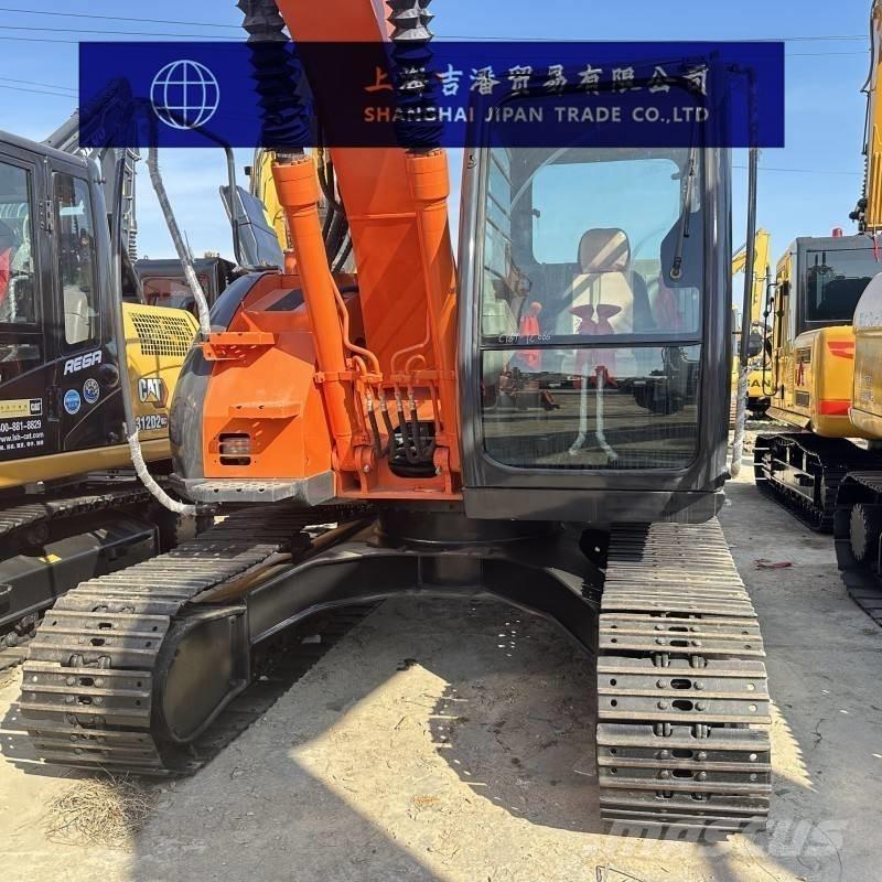 Hitachi ZX 135 Beltegraver