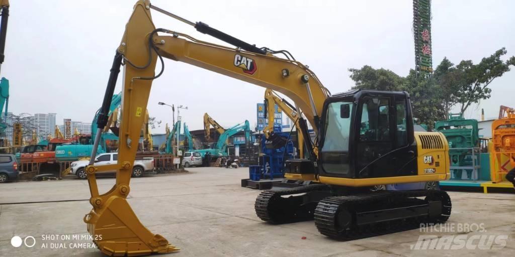 CAT 2021 CAT 313D2GC Hjulgravere