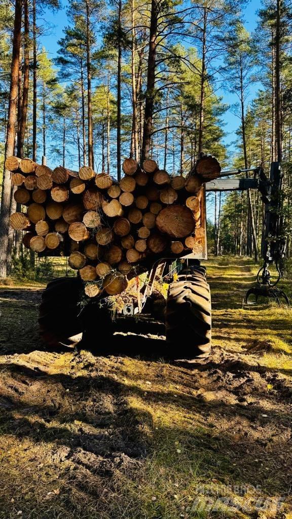 John Deere 1010G Lassbærere