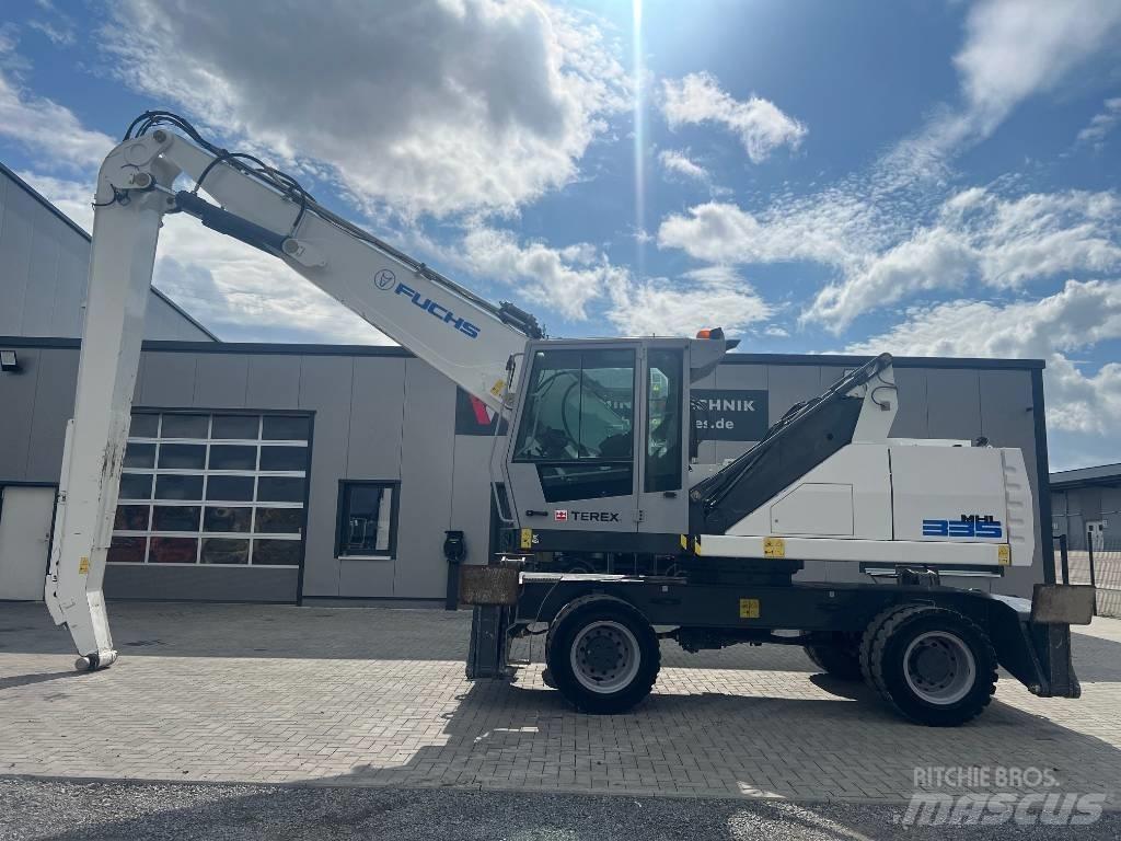 Fuchs MHL 335 Gravemaskiner for avfallshåndtering