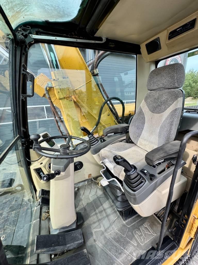 CAT M 318 C Hjulgravere