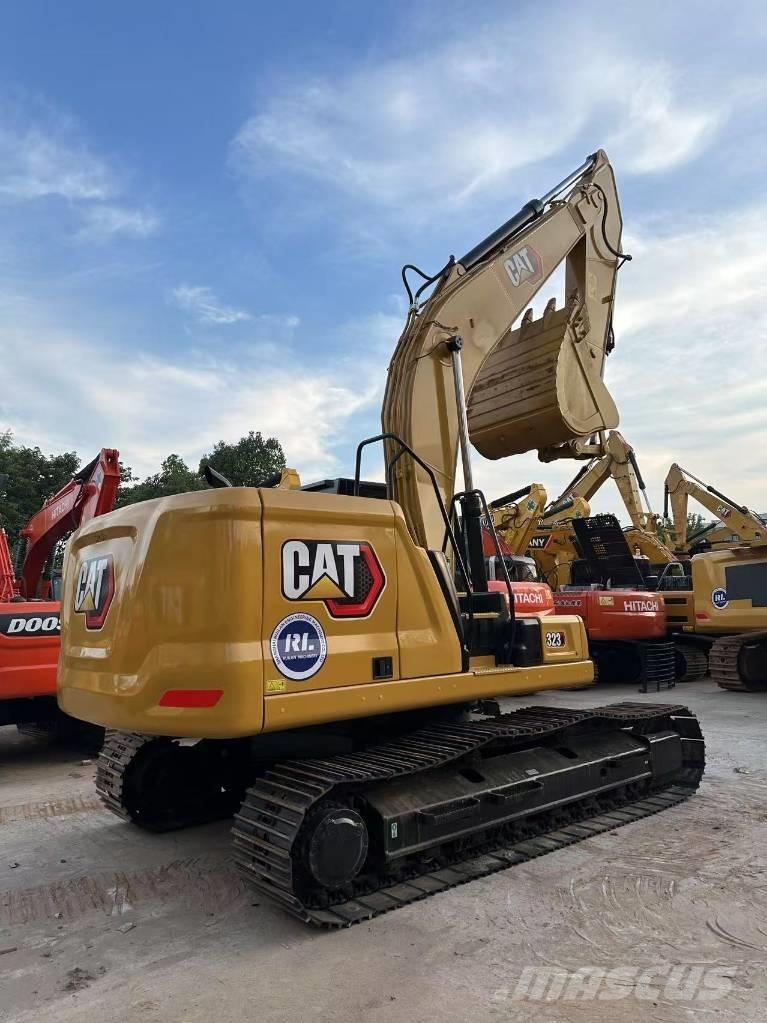 CAT 323 Beltegraver