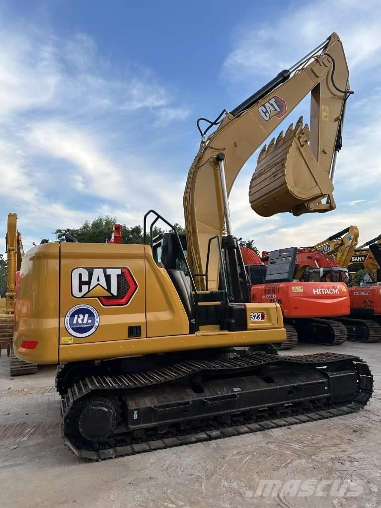CAT 323 Beltegraver