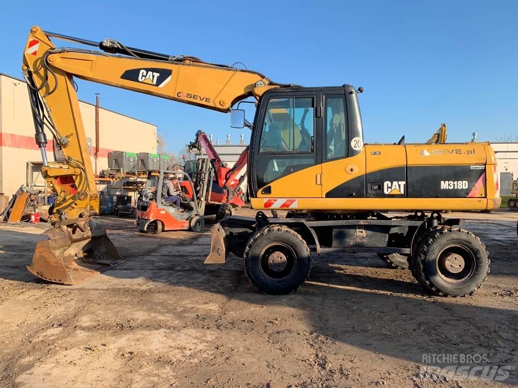 CAT M 318 D Hjulgravere