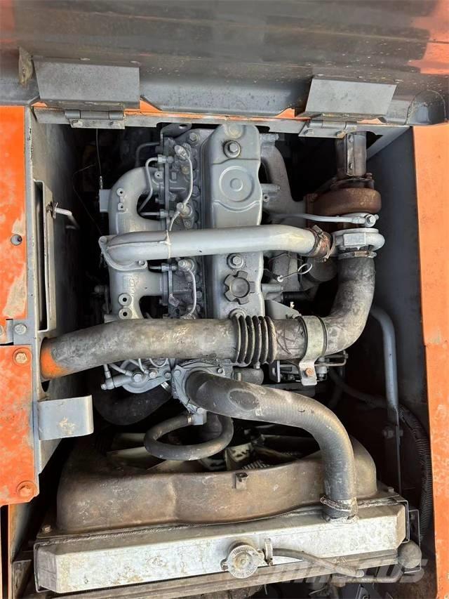Hitachi EX120 Beltegraver