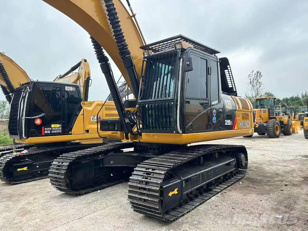 CAT 329 Beltegraver