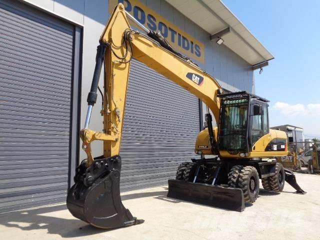CAT M 318 D Hjulgravere