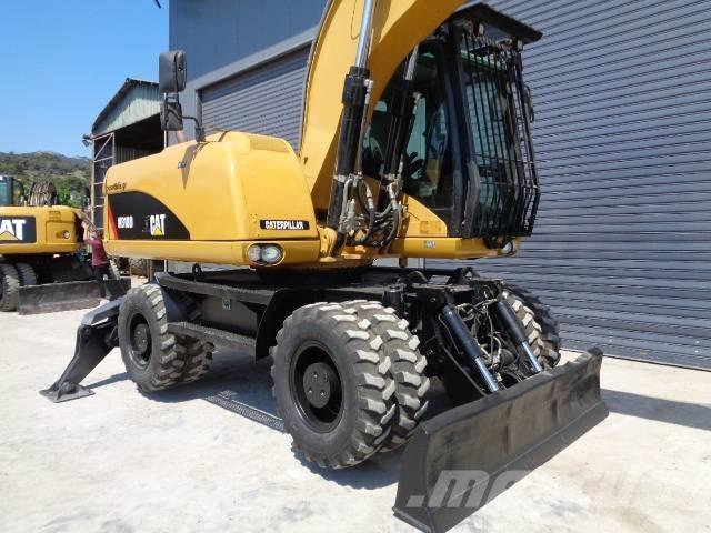 CAT M 318 D Hjulgravere