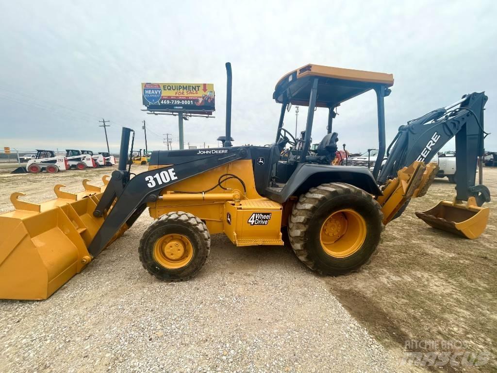 John Deere 310 E Traktorgravere