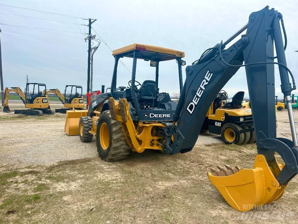John Deere 310 E Traktorgravere