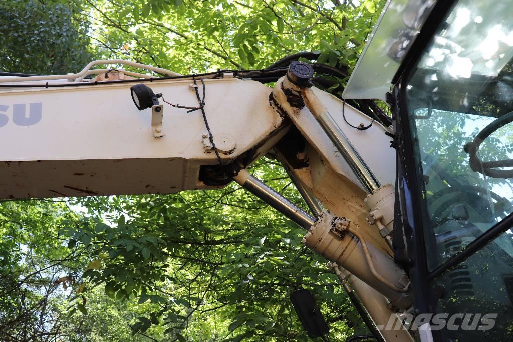 Komatsu PW 140-7 Traktorgravere