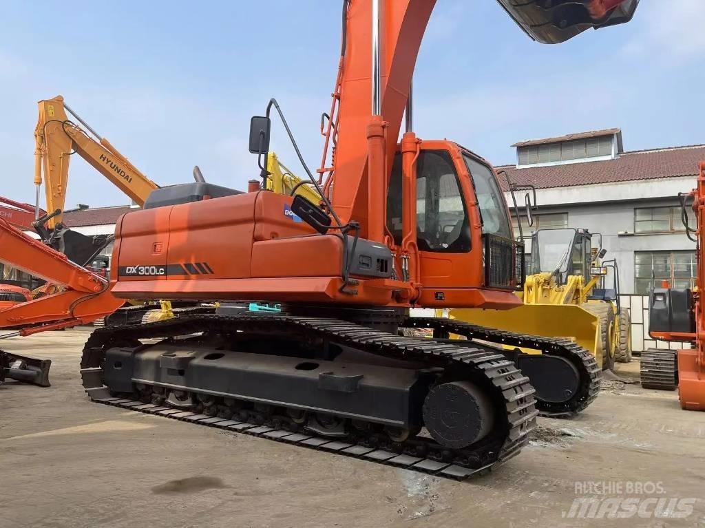 Doosan DX300LC Beltegraver