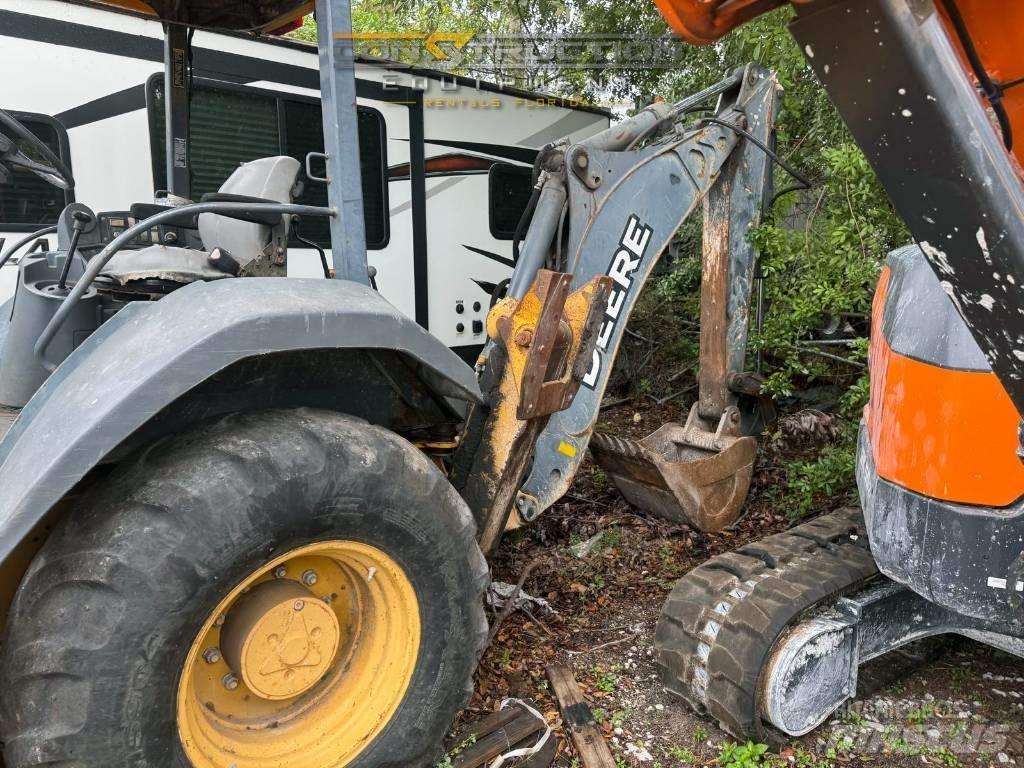 DEERE 310J Traktorgravere