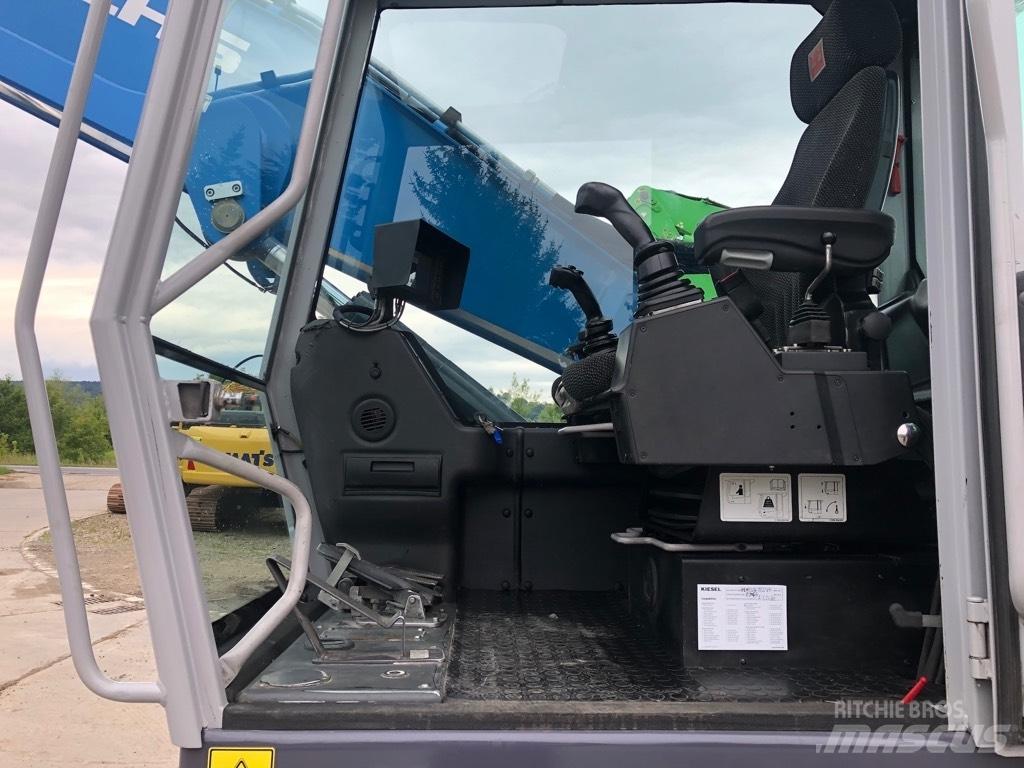 Fuchs MHL320 Gravemaskiner for avfallshåndtering