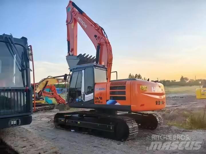 Hitachi ZX210 Beltegraver