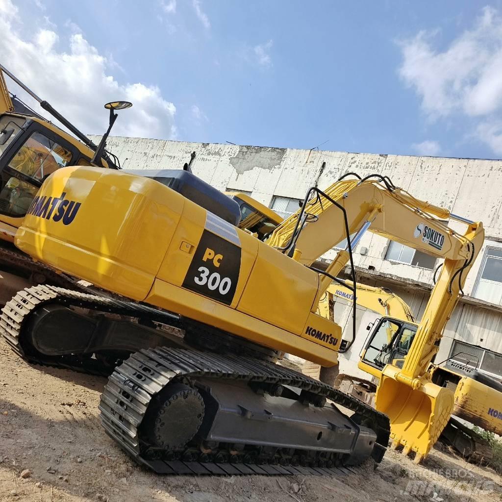 Komatsu PC300 Beltegraver