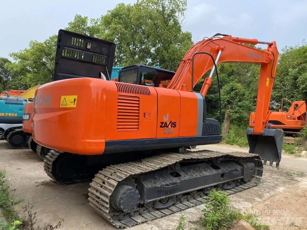 Hitachi ZX 210 Beltegraver