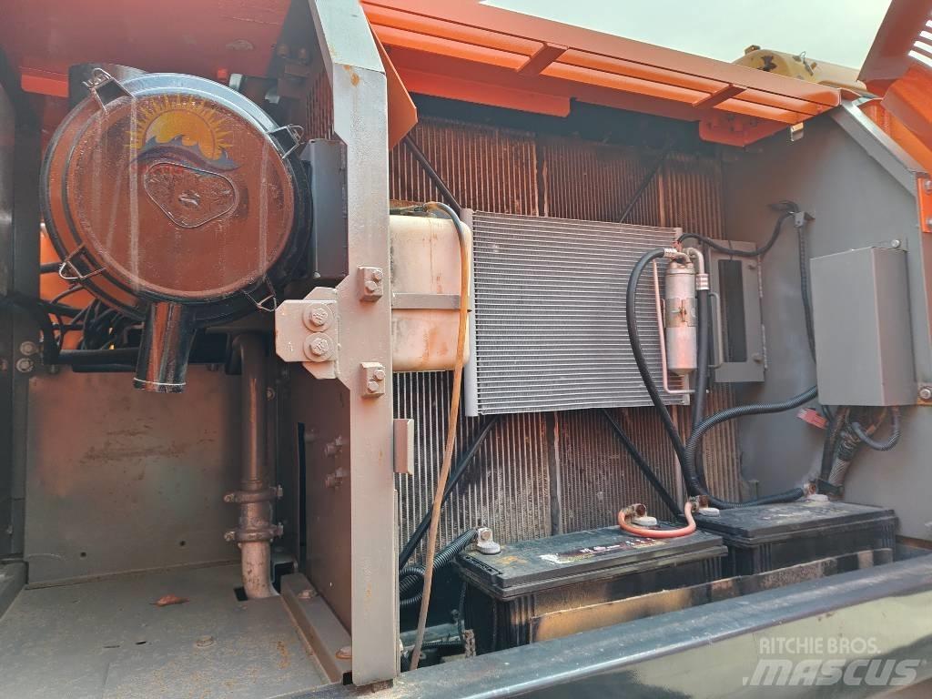 Hitachi ZX 210 Beltegraver