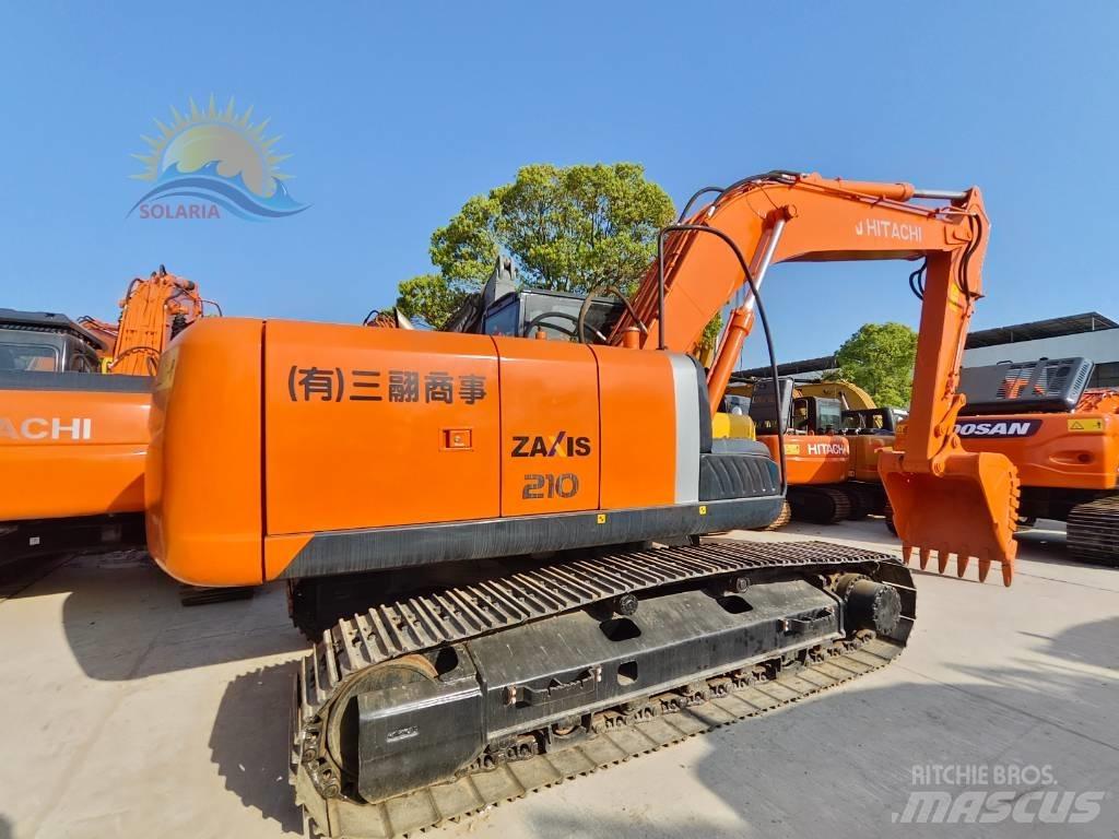 Hitachi ZX 210 Beltegraver