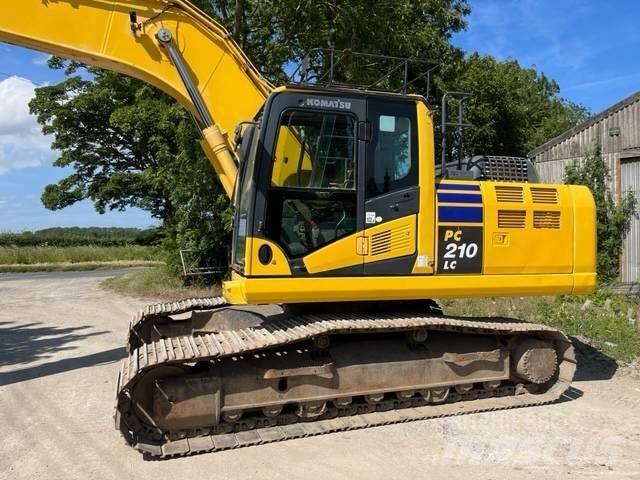 Komatsu PC 210 LC-10 Beltegraver