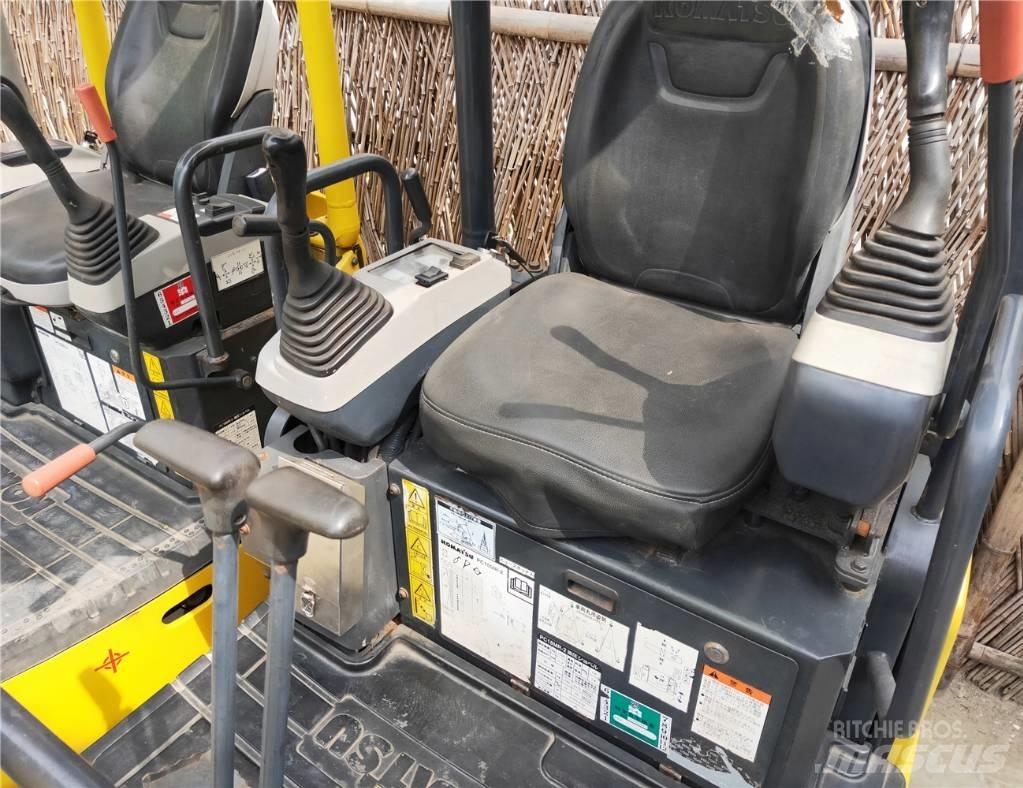Komatsu PC18 Beltegraver