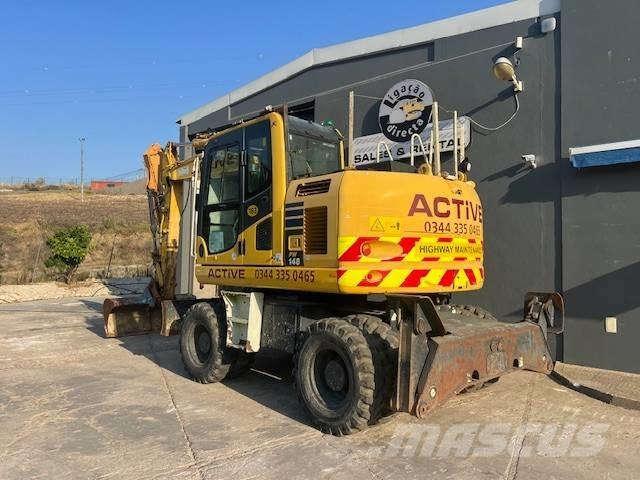Komatsu PW 148 Hjulgravere