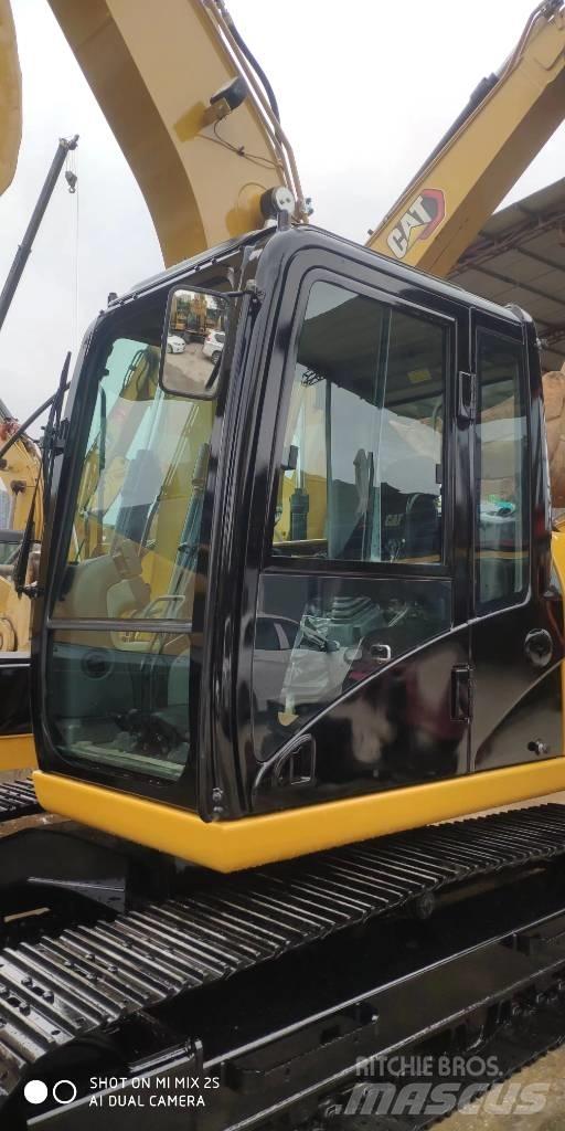 CAT 2021 CAT 313D2GC Hjulgravere