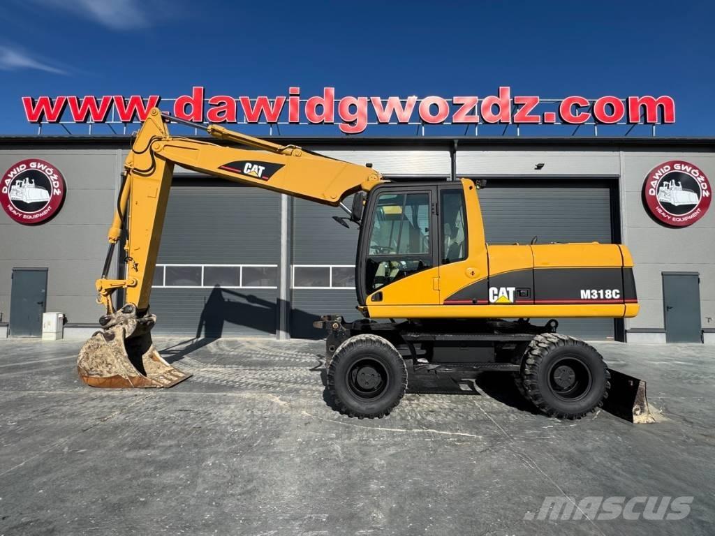 CAT M 318 C Hjulgravere