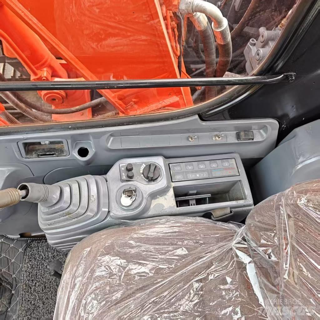 Hitachi EX 120 Beltegraver