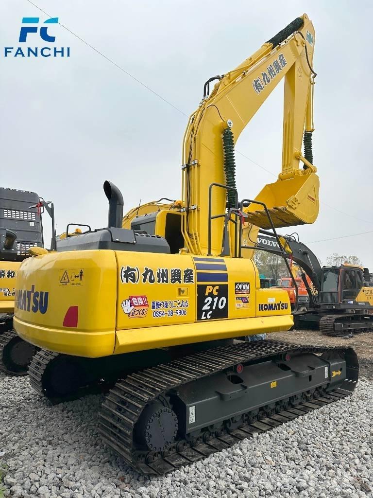 Komatsu PC 210-8 Beltegraver