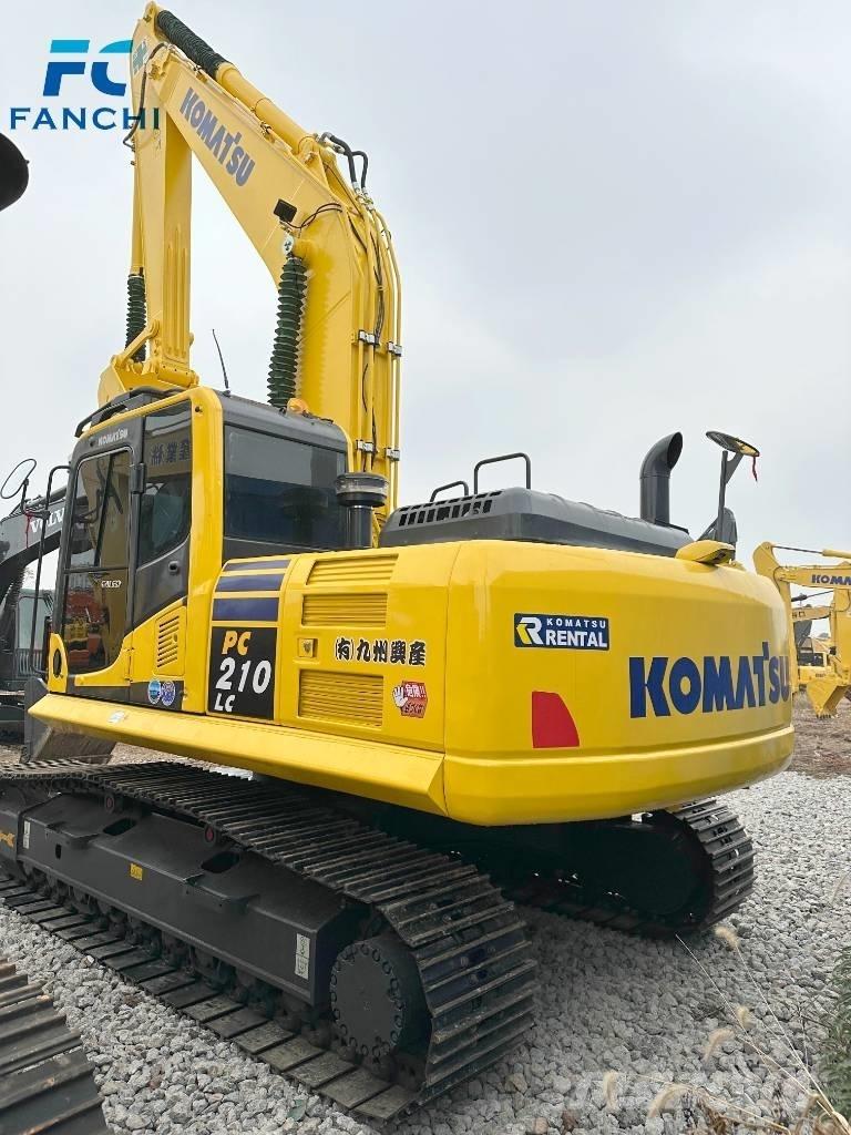 Komatsu PC 210-8 Beltegraver