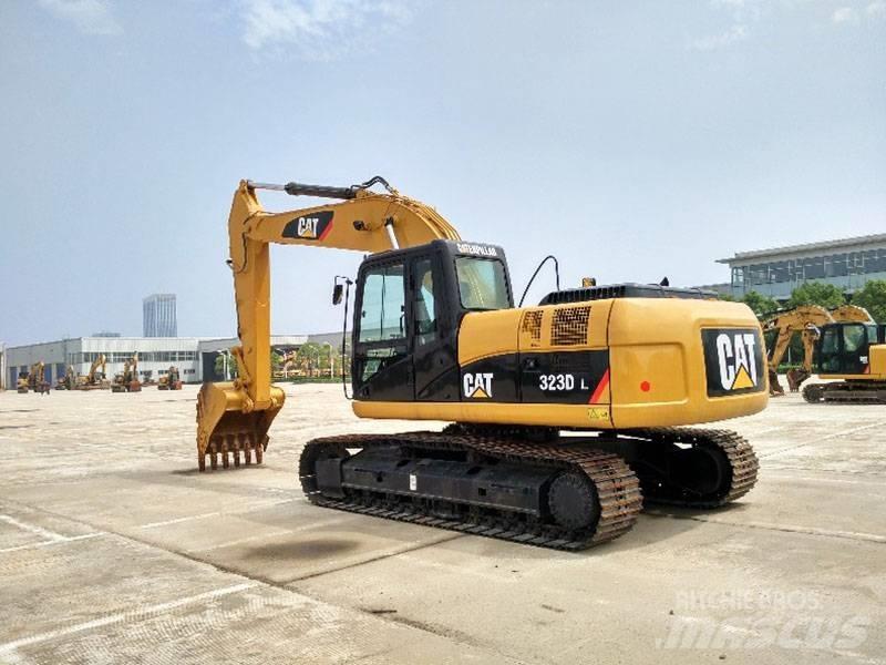 CAT 323 Beltegraver