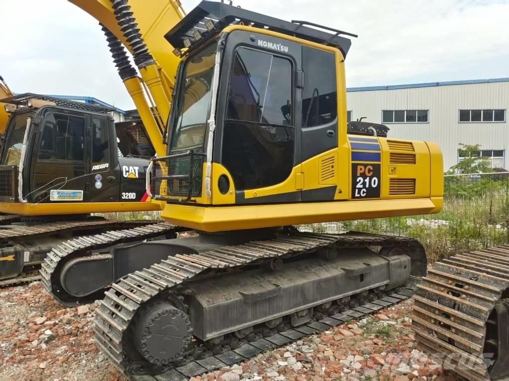 Komatsu PC 210 Beltegraver