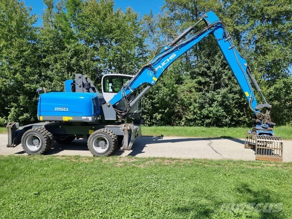 Fuchs MHL 250 Gravemaskiner for avfallshåndtering