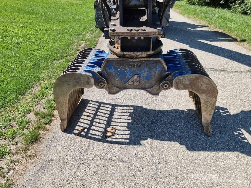 Fuchs MHL 250 Gravemaskiner for avfallshåndtering