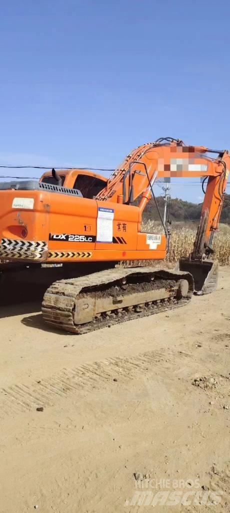 Doosan DX 225LC Beltegraver