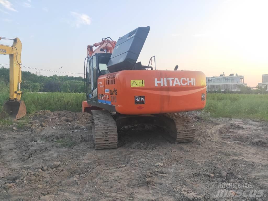 Hitachi ZX 210 Beltegraver