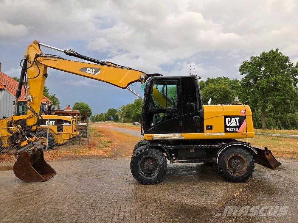 CAT M313D Hjulgravere