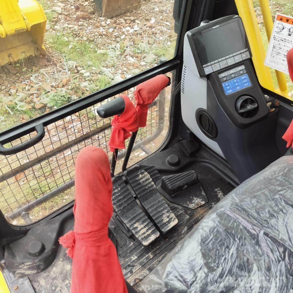 Komatsu PC200-8 Beltegraver