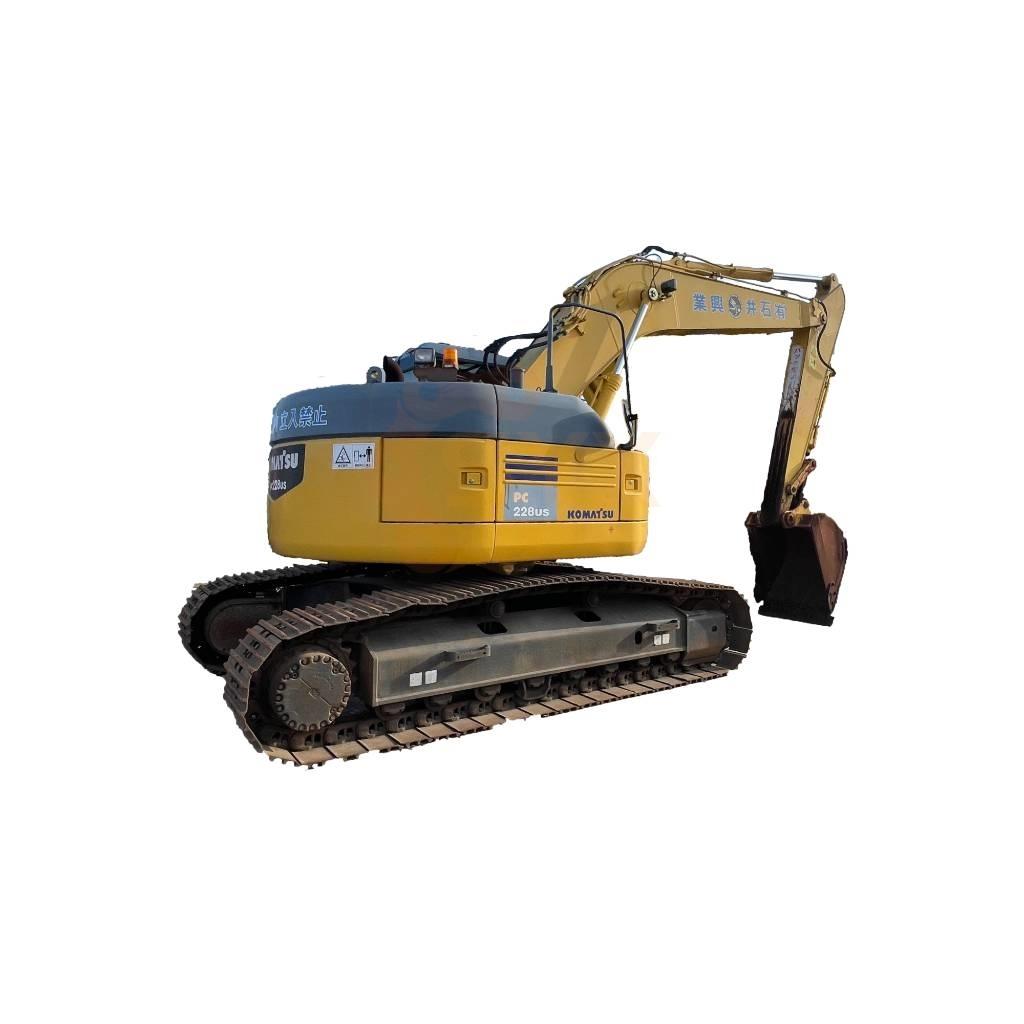Komatsu PC 228 US Beltegraver
