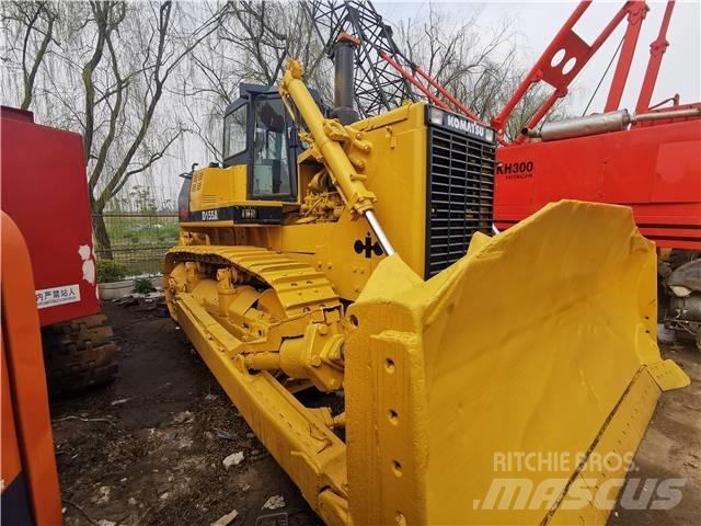 Komatsu D155A Dozere Beltegående