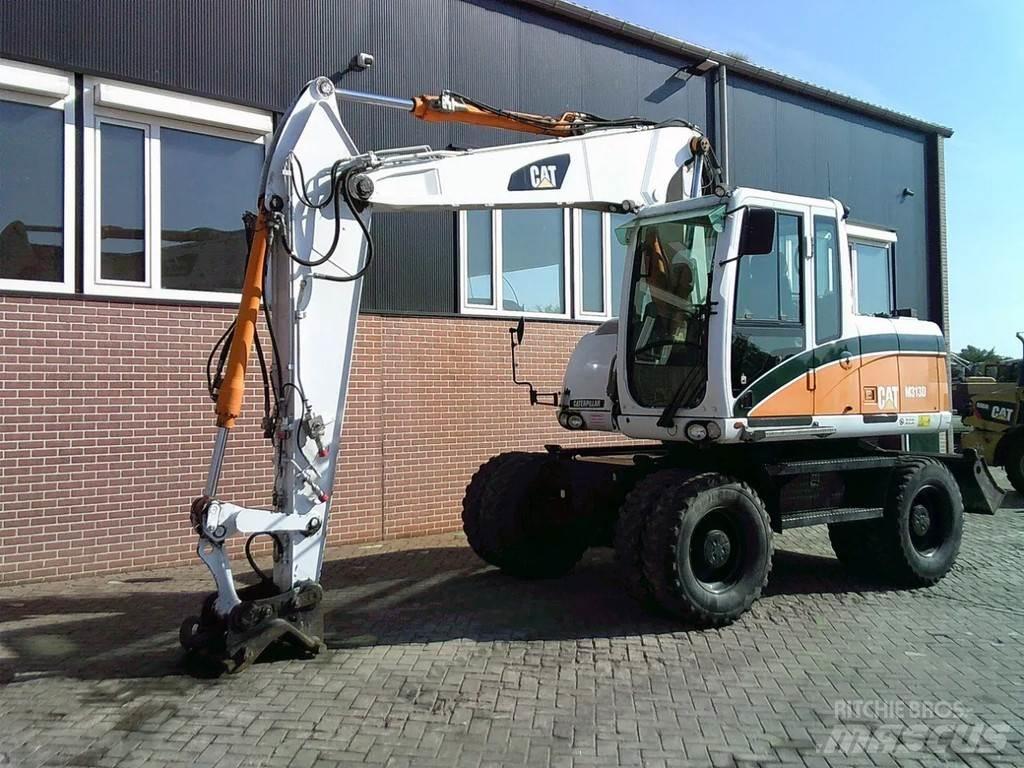 CAT M313D Hjulgravere